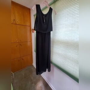 Womens sleevless, long black dress in a size Small
